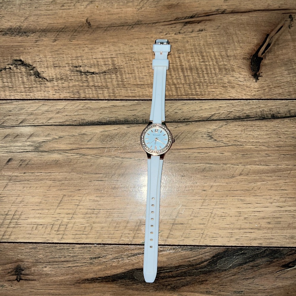 white and rose gold watch